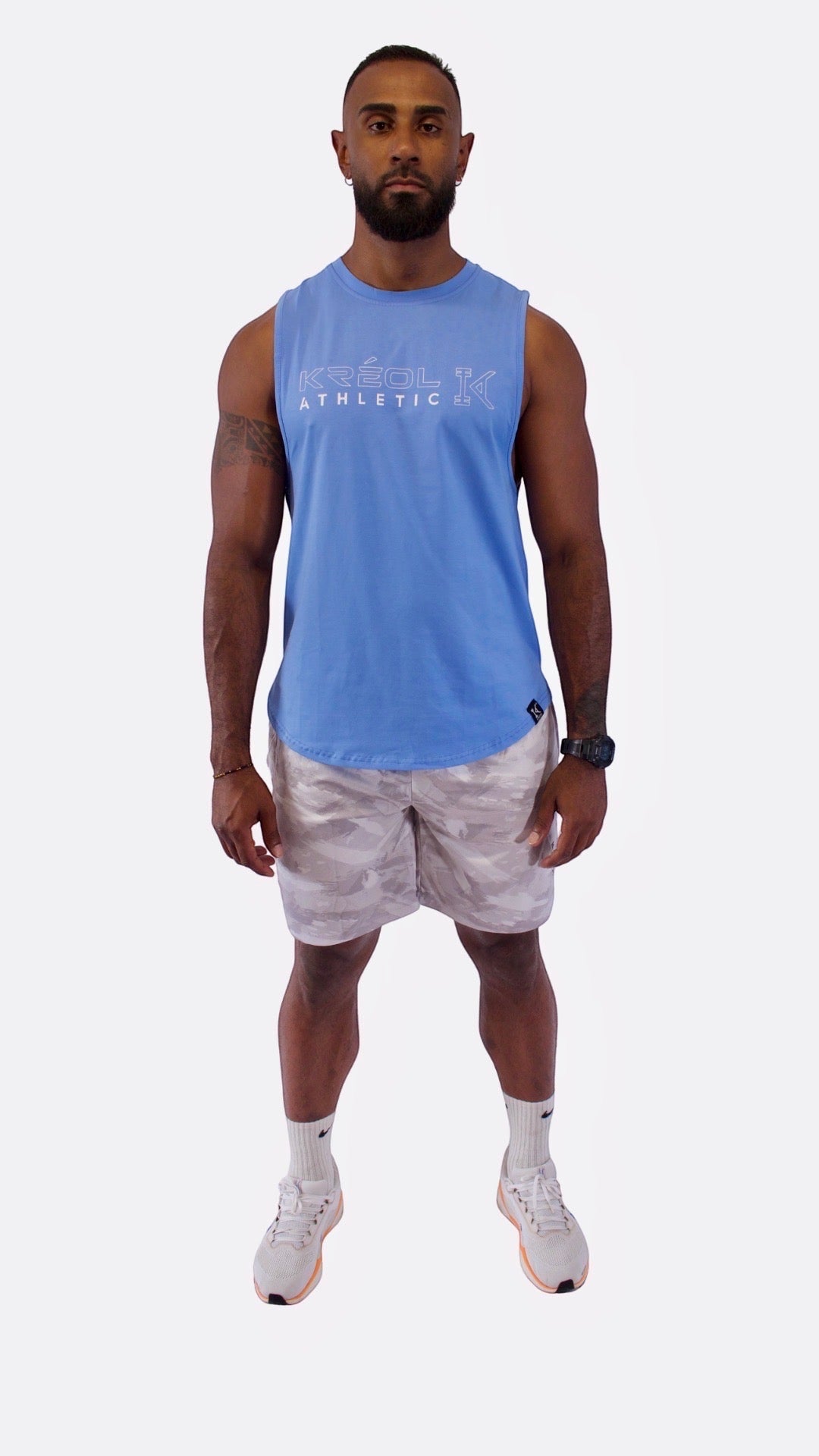 KRÉOL ATHLETIC Débardeur homme bleu ciel, coupe en V, sans manches, idéal pour la musculation et le sport.